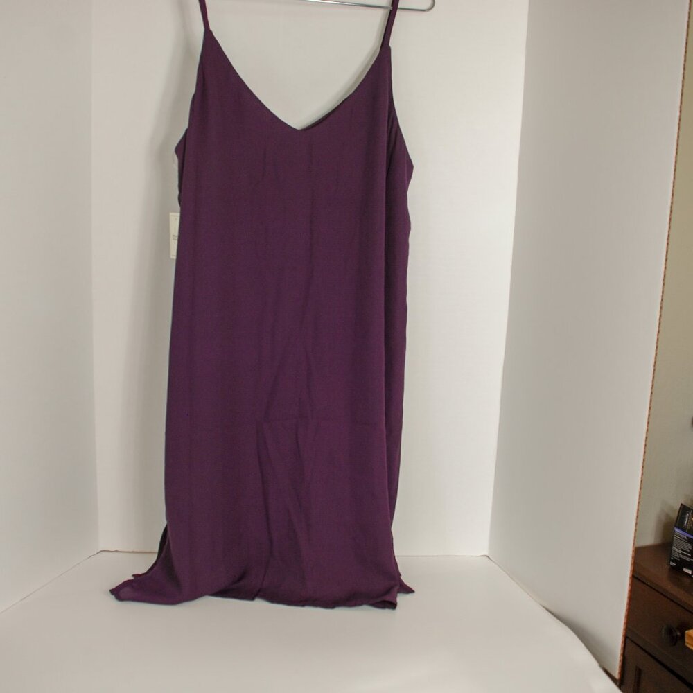 Slip dress in a dark purple color brand Meraki.